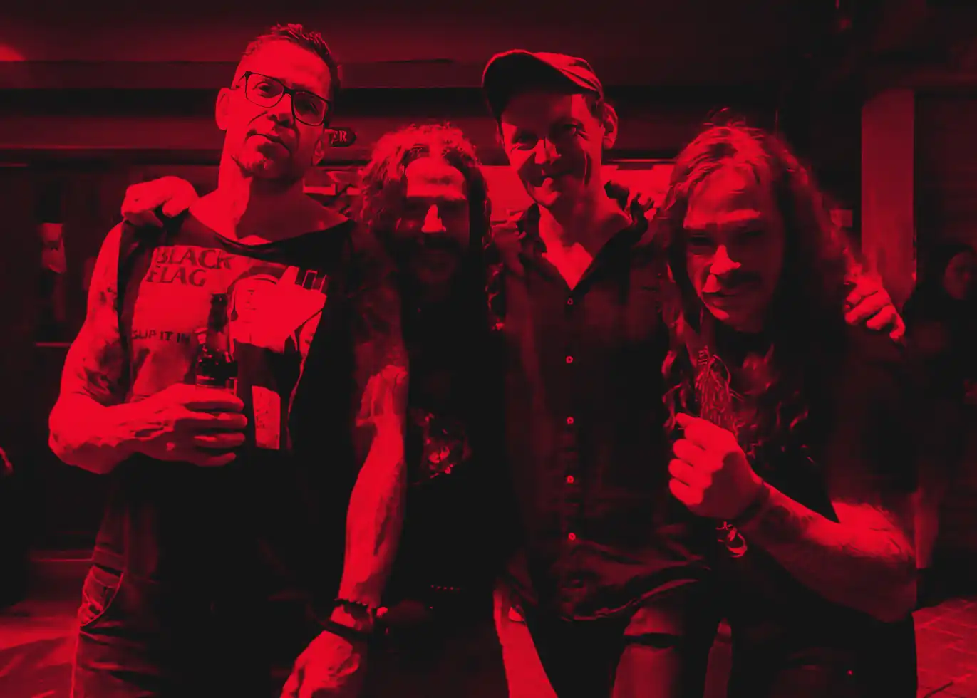 Worship Pain band members gathered after a show